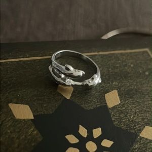 Silver tone dolphin ring